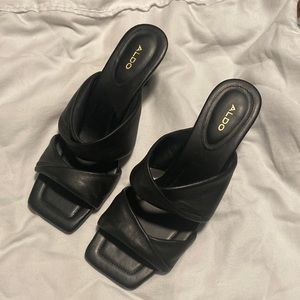 Never been worn. Size 7.5 black heels.